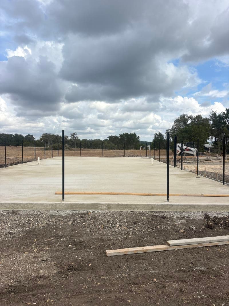 Before photo of worn residential court surface before resurfacing